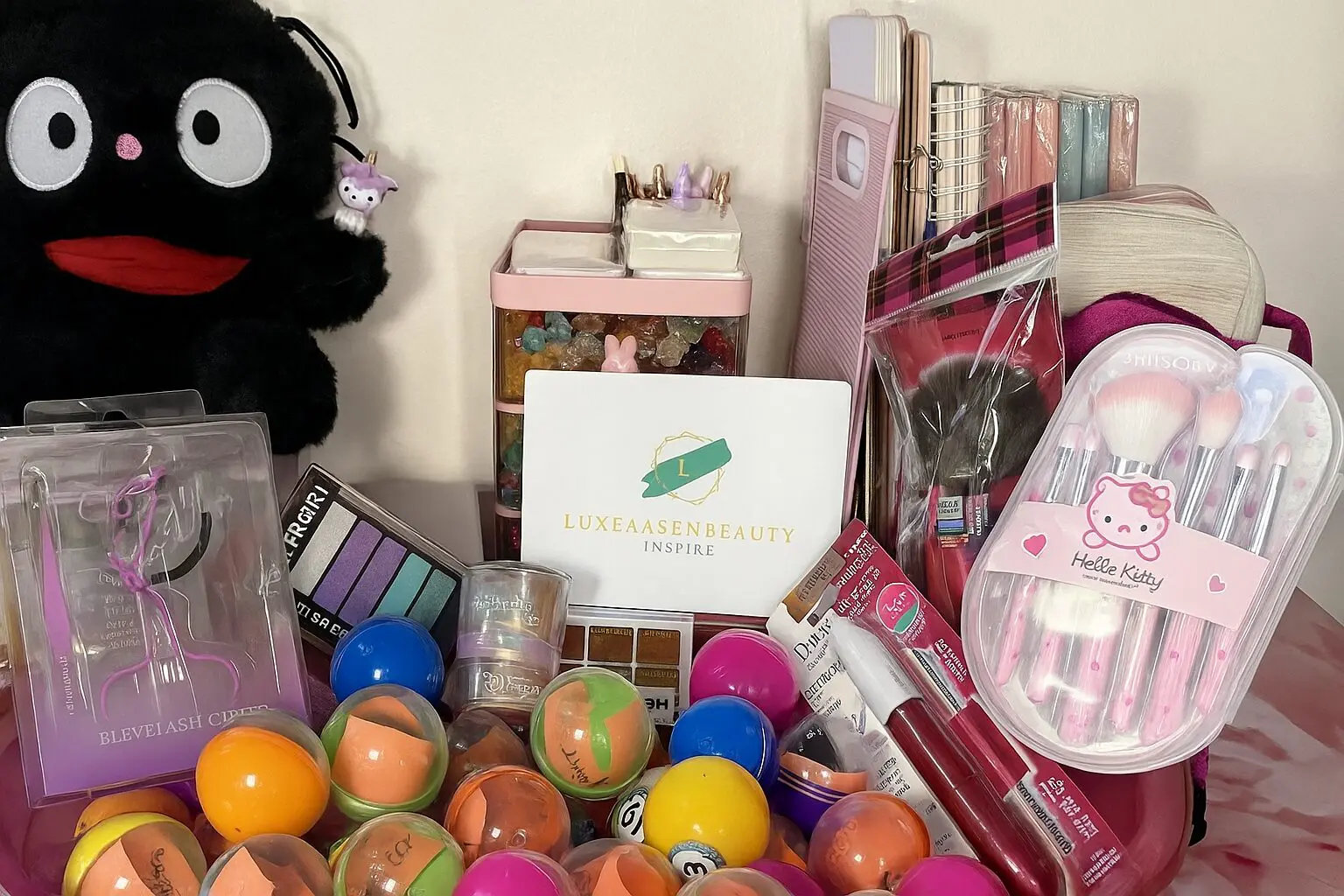 A variety of colorful beauty and personal care products arranged together.
