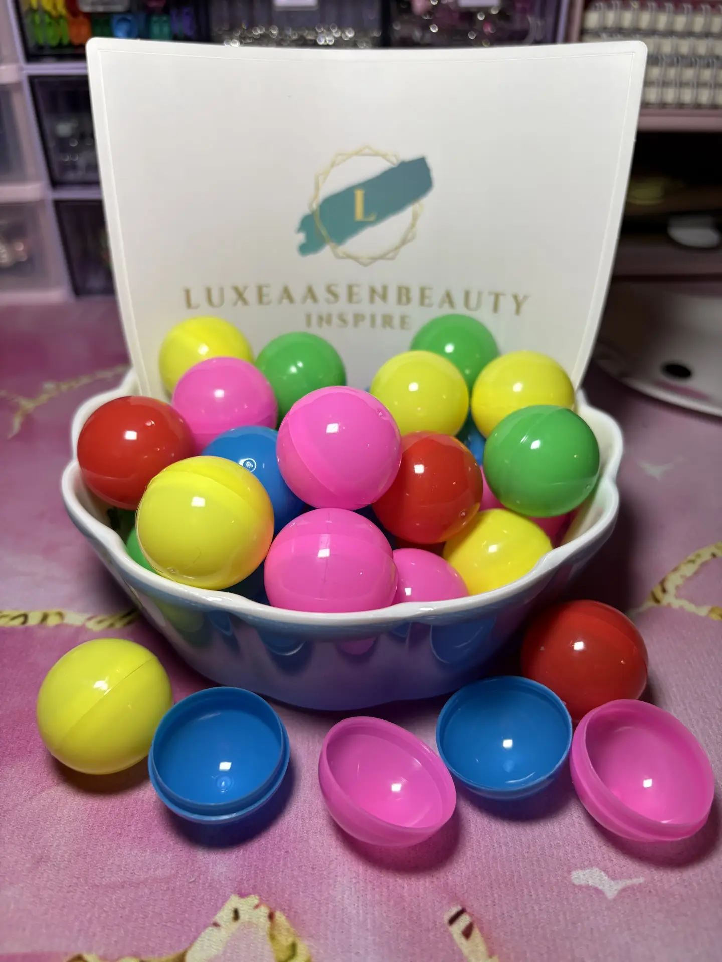 Colorful plastic balls in a bowl display.